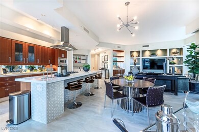 Kitchen with island exhaust hood, stainless steel