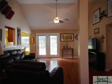 Living room with vaulted ceilings