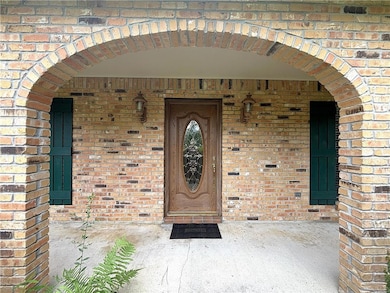 Stylish Brick Arches, Beveled Front Door