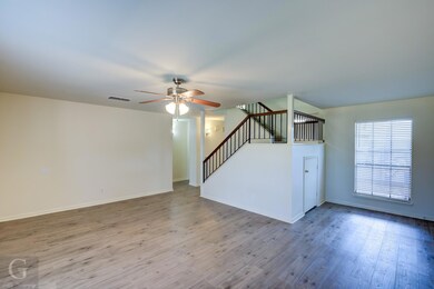 Living room with new floors, paint.