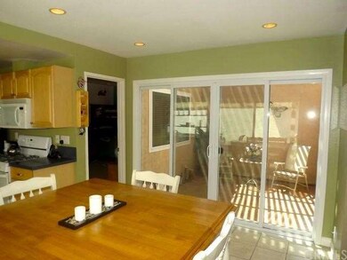 The Dining area is open to the Kitchen, Atrium and