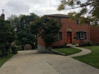 The double wide concrete driveway can accommodate 