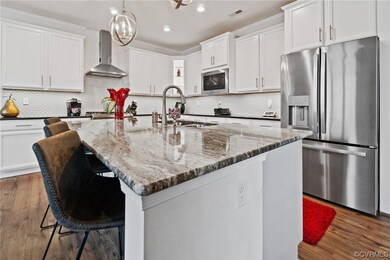 Kitchen featuring dark hardwood / wood-style floor