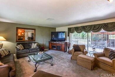 Living room with custom window coverings, dual pan
