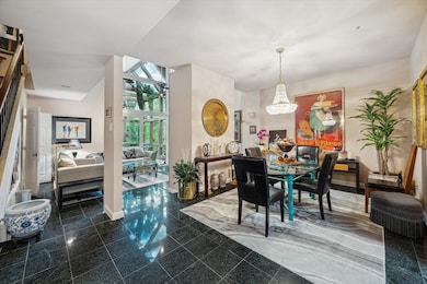 The generously sized dining room offers two openin