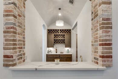 Wine bar with barrel ceiling and brick accent, sto