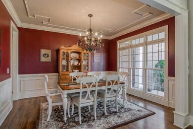This dining area will treat you to beautiful ceilings, great windows with transoms, beautiful floors, and a nice closet for coats or linens just outside the door.  Open floor plan makes the dining room a focal point as you enter the front door.
