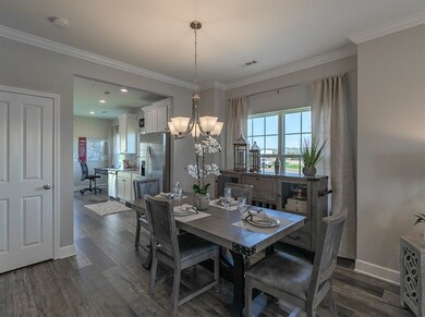 Formal dining room with views to family room and kitchen
