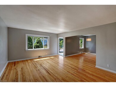 Spacioius living room with beautiful hardwood floo