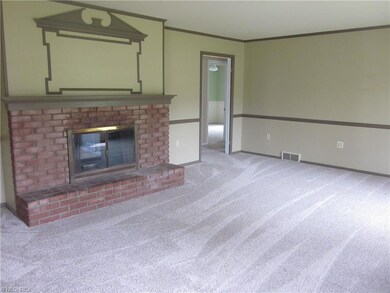 Large living room with wood-burning fire place goi