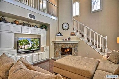 Family room has vaulted ceiling with a beautiful c
