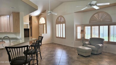 Great Room with custom shutters & tile f