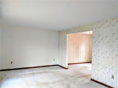 Spacious living room opens up to good size dining 