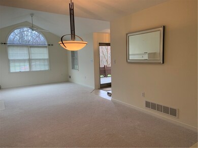 Dining area next to formal living area.
