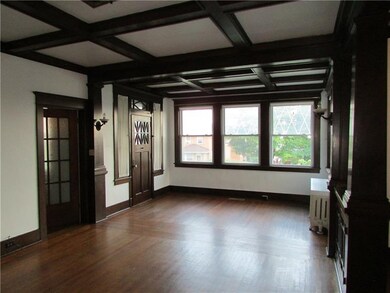 Huge living room opens to sun room with loads of o