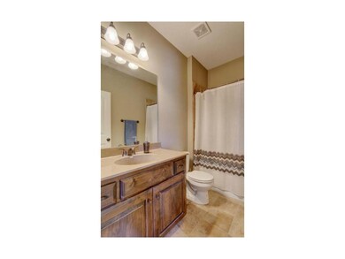 Full bath on main, tiled floors!