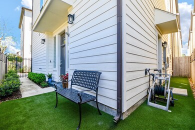 Cozy outdoor seating area accented with string lig