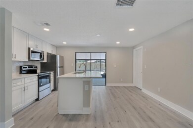 3723 Meadowbreeze Dr, Tampa, FL 33619 - photo 5