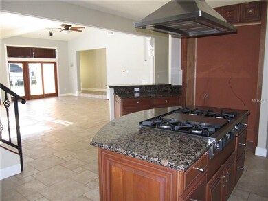 Kitchen opens to great room with gas cooktop & sta