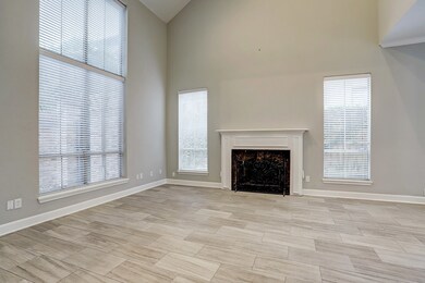 Soaring vaulted ceiling in the living room with ga