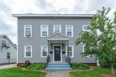 Vinyl sided exterior with vinyl thermopane windows