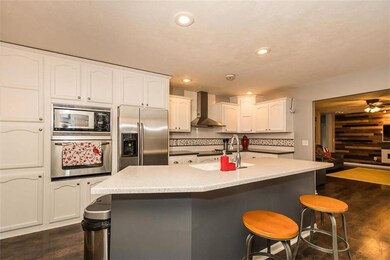 Beautiful kitchen with new hard surface counter to