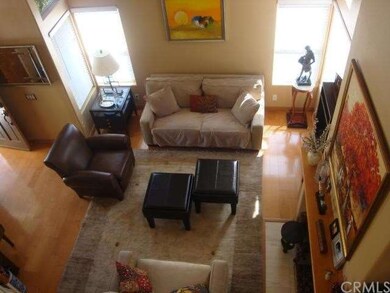 Looking down from stairwell, the Living room.