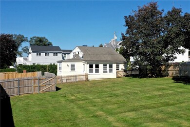 Beautiful open fenced-in yard on south side of pro