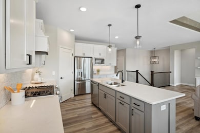 Kitchen - image is of a former model home for visual purposes.