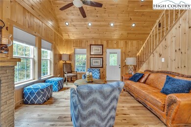 Great room features a cathedral ceiling