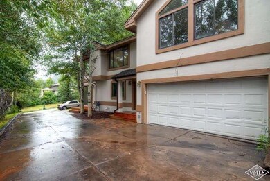 2 car garage plus parking spaces off the
