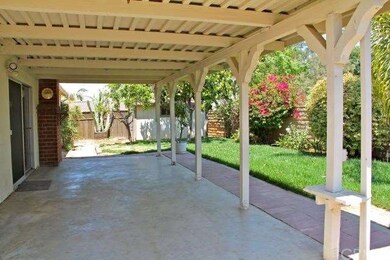 Terrific backyard with a covered patio, gorgeous l