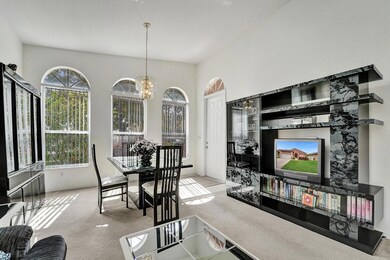 Formal living and dining room at entrance to the h