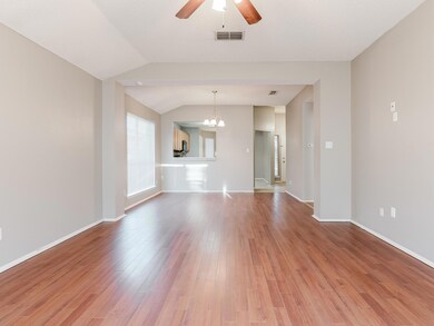 Unfurnished living room with visible vents, light 