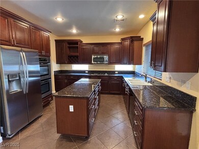 Kitchen featuring a kitchen island, open shelves,