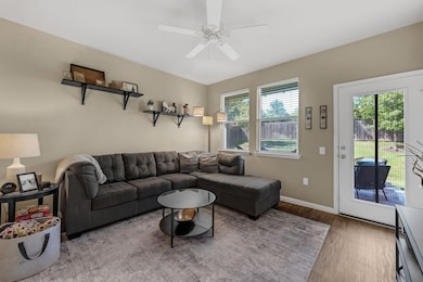 Living area with wood finished floors and ceiling