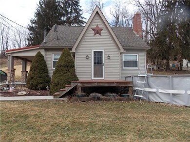 Exterior Front. Pool will be removed.
