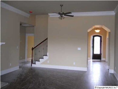 Great large & open family room with hardwood stairs tucked away, Carpet is standard in Family room, Hardwood optional