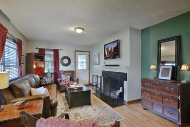 Living room with hardwood floors and WBF