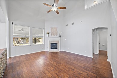 Living room with two story ceilings