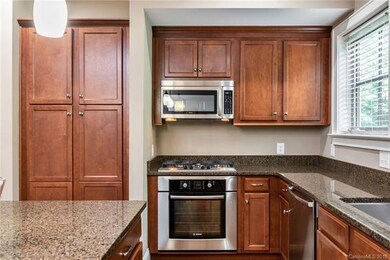Natural light floods into the kitchen accentuating