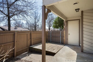 fully fenced private courtyard with extra storage
