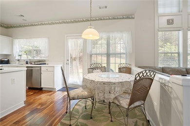 Breakfast space featuring hardwood / wood-style floors