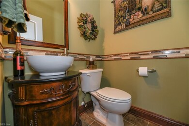 This is the guest half bath with vessel sink, tile