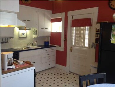 Kitchen is bright and cheery.
