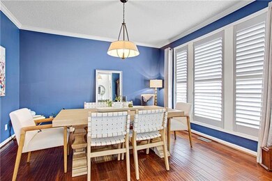 Dining room is spacious and bright.