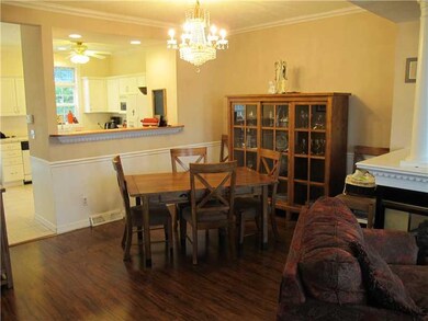 Exterior Front. Dining room has new laminated floo
