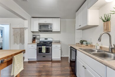 Kitchen featuring dark hardwood / wood-style floor