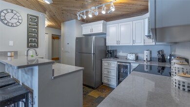 155 Aurora Lights Dr unit B-10, Big Sky, MT 59716 - photo 2
