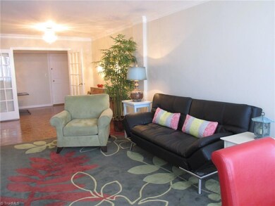 The open living room measures a gracious 13' 11